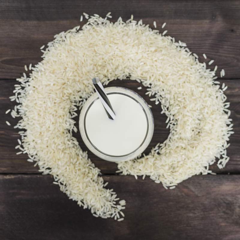 elevated-view-rice-milk-rice-grains-arranged-weathered-background ...